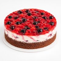 Forest fruit cake with red berry jelly, cream and chocolate sponge
